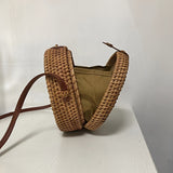 Bohemian Chic Rattan Woven Crossbody Bag - Handcrafted Vintage Circle Bag with Braided Detail and Buckle Accent - Perfect for Women