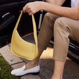 23s Luxurys Totes Designers Bags High end leather shoulder bag women's armpit irregular fashion portable crescent simple hand Cross body bag The same as kendou Wallet