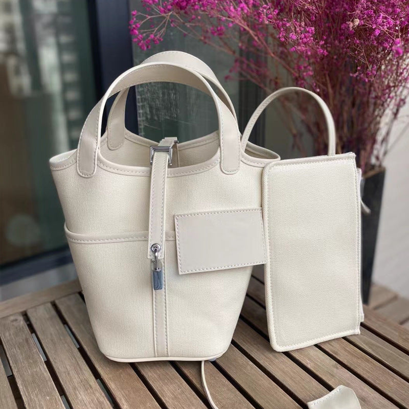 VLOVELAW 2025 Hot trade new vegetable basket bag swift cowhide with canvas splicing bucket bag fashionable casual hand bag