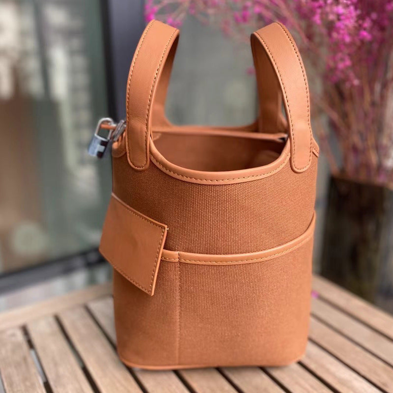 VLOVELAW 2025 Hot trade new vegetable basket bag swift cowhide with canvas splicing bucket bag fashionable casual hand bag